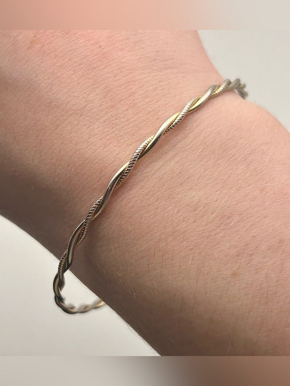 Classic Gold Tone Twisted Bangle Bracelet with Texture - Chic Stacking Accessory